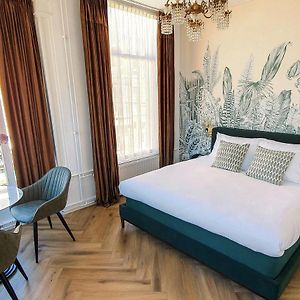 Kamer met een Queen Size Bed